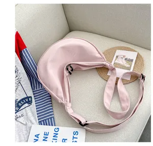 Sac à bandoulière croissant en toile rose, sac fourre-tout décontracté pour femme.