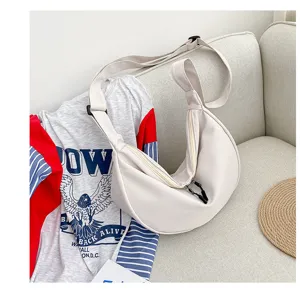 Sac bandoulière minimaliste en toile, sac hobo décontracté avec fermeture éclair pour les femmes.