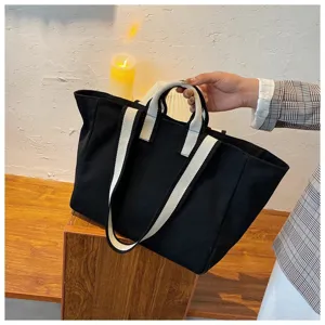 Canvas tote bag for women, large capacity shoulder bag, simple daily commuting casual handbag.