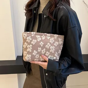 Chic floral textured cosmetic bag portable makeup pouch stylish clutch handbag for women main view