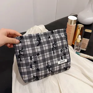 Black and white plaid lace cosmetic bag, vintage portable makeup pouch for women daily use.