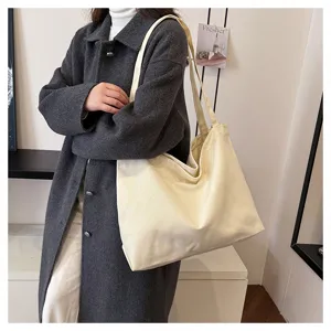 Casual canvas tote bag for women, large capacity minimalist shoulder bag for daily commute.