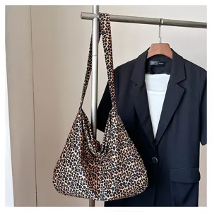 Leopard print canvas shoulder bag, casual slouchy tote bag, large capacity daily handbag.