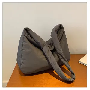 Casual women shoulder bag large capacity solid color puffer crossbody bag daily commute style.