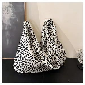 Black and white leopard print canvas tote bag, casual large capacity shoulder bag.