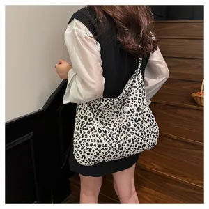 Stylish leopard print canvas shoulder bag, casual large capacity tote bag for women.
