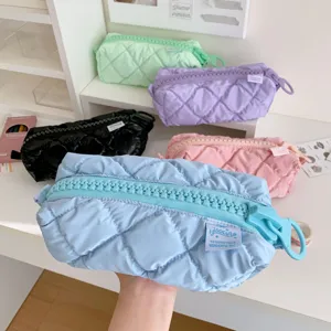 Cute quilted pencil case with oversized zipper, large capacity aesthetic makeup bag for daily use.