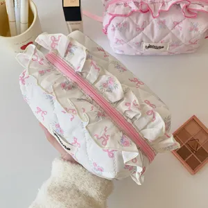 Korean style floral quilted makeup bag with cute ruffles and pink zipper for daily carry.
