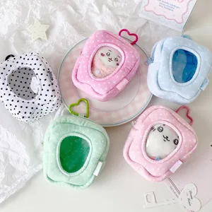 Polka dot plush mini doll bag with heart pendant and clear window for cute collectibles and coins.