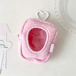 Pink polka dot plush mini ita bag with heart window and cute charm ring for doll storage.