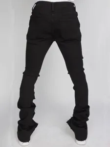 Men's black stacked flare distressed denim jeans, slim fit stretch casual fashion pants.