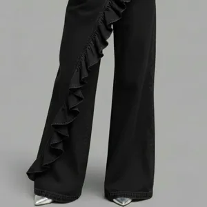Black women's flare denim pants with chic asymmetrical ruffle design for spring and summer.