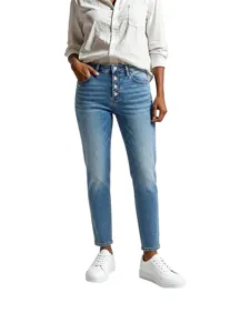 Women's high-waisted button-fly washed skinny jeans main product studio display view.