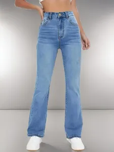 Light blue high waisted micro flare denim jeans detail shot highlighting slim fit design