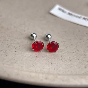 Red zirconia cartilage stud earrings with secure stainless steel screw back for daily wear.
