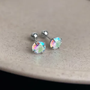 Closeup of colorful iridescent cubic zirconia cartilage stud earrings with 304 stainless steel screw backs.