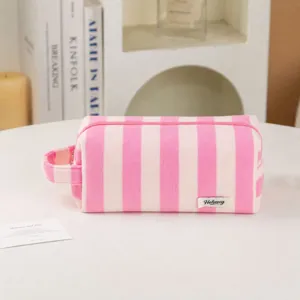 Pink striped plush cosmetic bag with handle, large capacity portable toiletry makeup pouch.