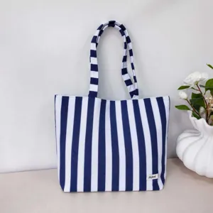 Blue and white striped canvas tote bag casual fashion shoulder bag for women daily use.