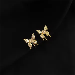 Goldene Schmetterling Ohrclips mit weißem Perlmutt und Kristall, elegante Ohrringe für Damen.