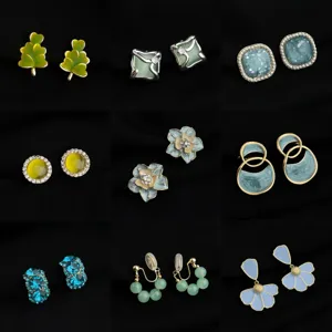 Detailed view of fashionable non-pierced clip-on earrings in various chic designs and vibrant colors.