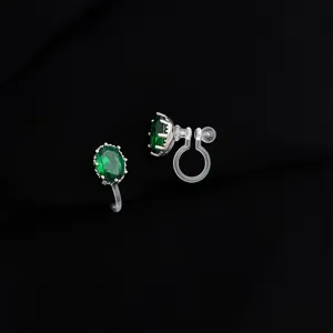 Elegante ovale grüne Kristall-Ohrclips für Damen, unsichtbares Harz-Clip-Design neu.