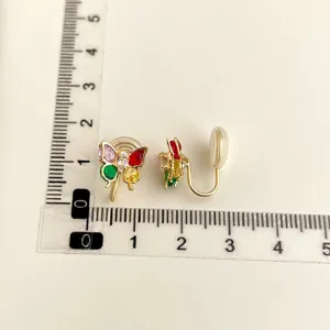 Detailed view of colorful crystal butterfly clip-on earrings with 18k gold plating.
