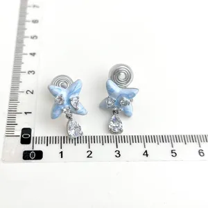 Elegante blaue Emailliert Stern Clip-Ohrringe mit funkelnden Zirkonia und Tropfenanhänger.