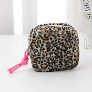 Cute leopard print plush cosmetic bag with pink knot zipper pull, compact storage pouch.