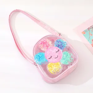 Pink transparent front girls crossbody bag detail showing cute sunflower sequin design.