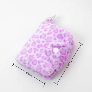 Plush leopard print small wallet detail, cute furry card holder with snap and hook design.
