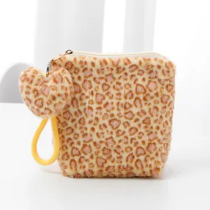 Plush leopard print cosmetic bag with heart pendant and portable strap, small makeup pouch.