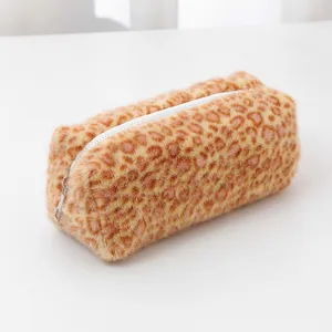 Fluffy plush leopard print pencil case detail view, soft cosmetic storage bag display.