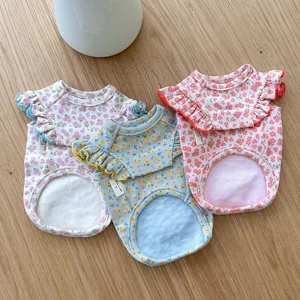 Detailed view of cute floral pet vest for small dogs and cats with ruffles and cute design.