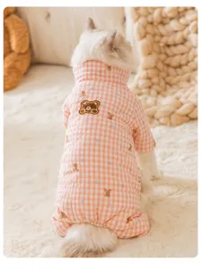 Cute checkered pet winter cotton clothes detail, cozy bear embroidered warm four-legged cat apparel.