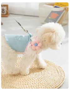 Charming denim and pink striped dog harness dress with cute flower detail for summer pets.