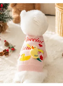 Detailed view of cute pink knitted pet dog sweater with duck toy for autumn winter daily wear.