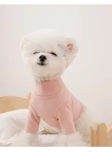 Cute pink pet turtleneck thermal shirt for dogs and cats, cozy autumn winter apparel.