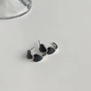 Black heart drop oil silver plated hoop earrings detail view, minimalist style fashion jewelry.