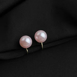 Elegante rosafarbene Glasperlen Clip-Ohrringe für ungepiercte Ohren mit vergoldetem Finish.