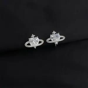 Detailed view of silver heart orb zirconia clip-on earrings, elegant diamond paved design.