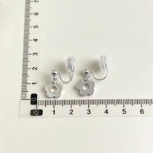 Silver flower clip-on earrings with invisible mosquito coil back, simple and elegant daily jewelry.