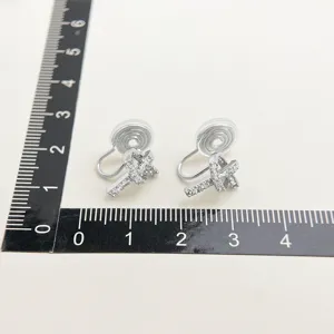 Elegant micro-set zircon cross clip-on earrings with comfortable invisible coil backs.