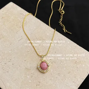 Gold plated stainless steel natural stone necklace, pink stone pendant clavicle chain detail.