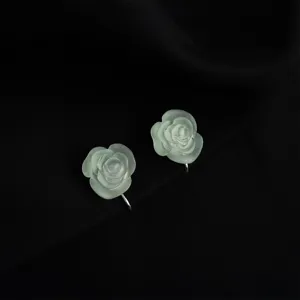 Elegant frosted green rose clip-on earrings for non-pierced ears, chic floral jewelry.
