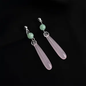 Elegant pink teardrop stone drop earrings with green beads and silver metal details. Chic.