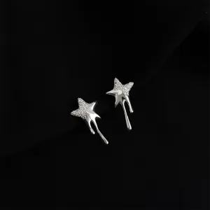 Silver-tone melting star clip-on earrings with micro-pave zirconia, unique drip design.