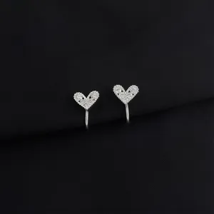 Heart-shaped micro-pave zircon clip-on earrings, elegant silver tone non-pierced ear cuffs.