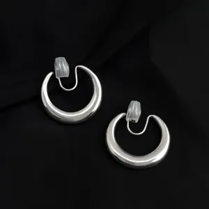 Silver crescent clip on earrings detail shot, non pierced ear clip jewelry accessories.