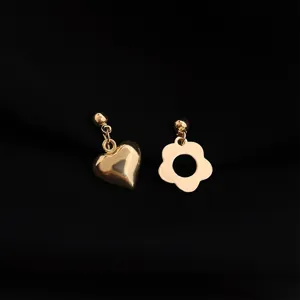 Eleganti orecchini a clip asimmetrici con cuore e fiore placcati in oro per donne senza fori.