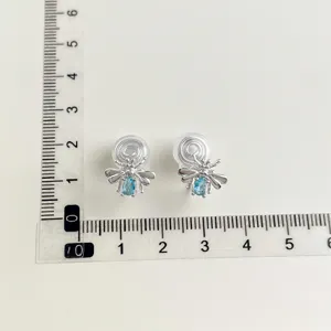 Clip-on bee earrings with blue crystal stone, comfortable invisible coil design for non-pierced ears.